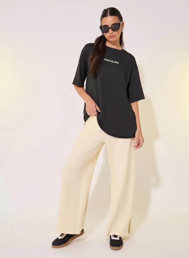 تايك تو Slogan Print Round Neck Oversized T-Shirt
