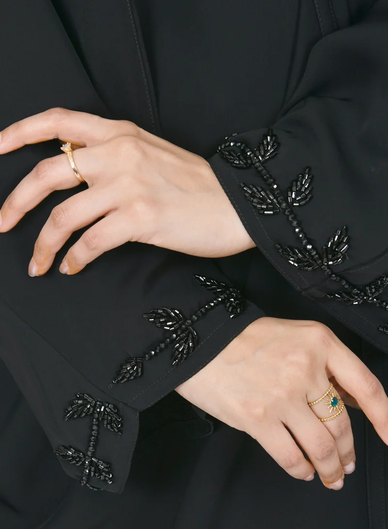 HAWRAA ABAYA Wrap head abaya with wide sleeves decorated with a soft handmade check