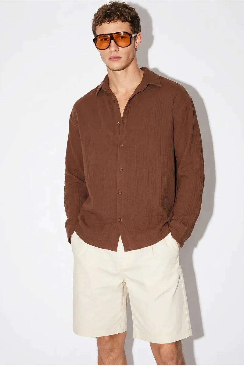 بيانكو لوتشي LUCCI Oversized Textured Button-Front Shirt