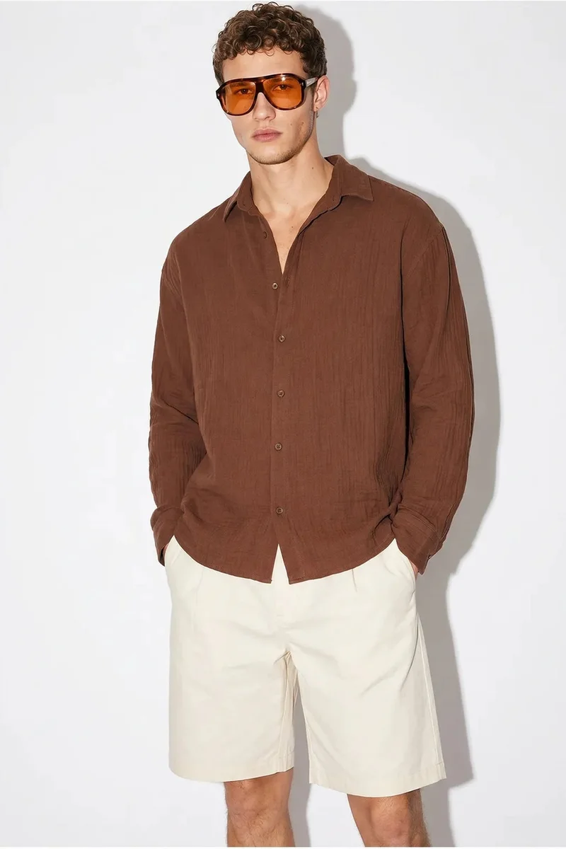بيانكو لوتشي LUCCI Oversized Textured Button-Front Shirt