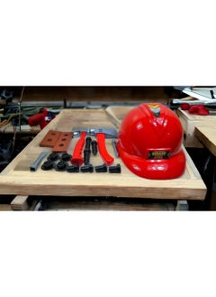 me carpenter equipment appears to be a set of carpentry tools and equipment such as helmets, hammers, saws, screws and wooden panels