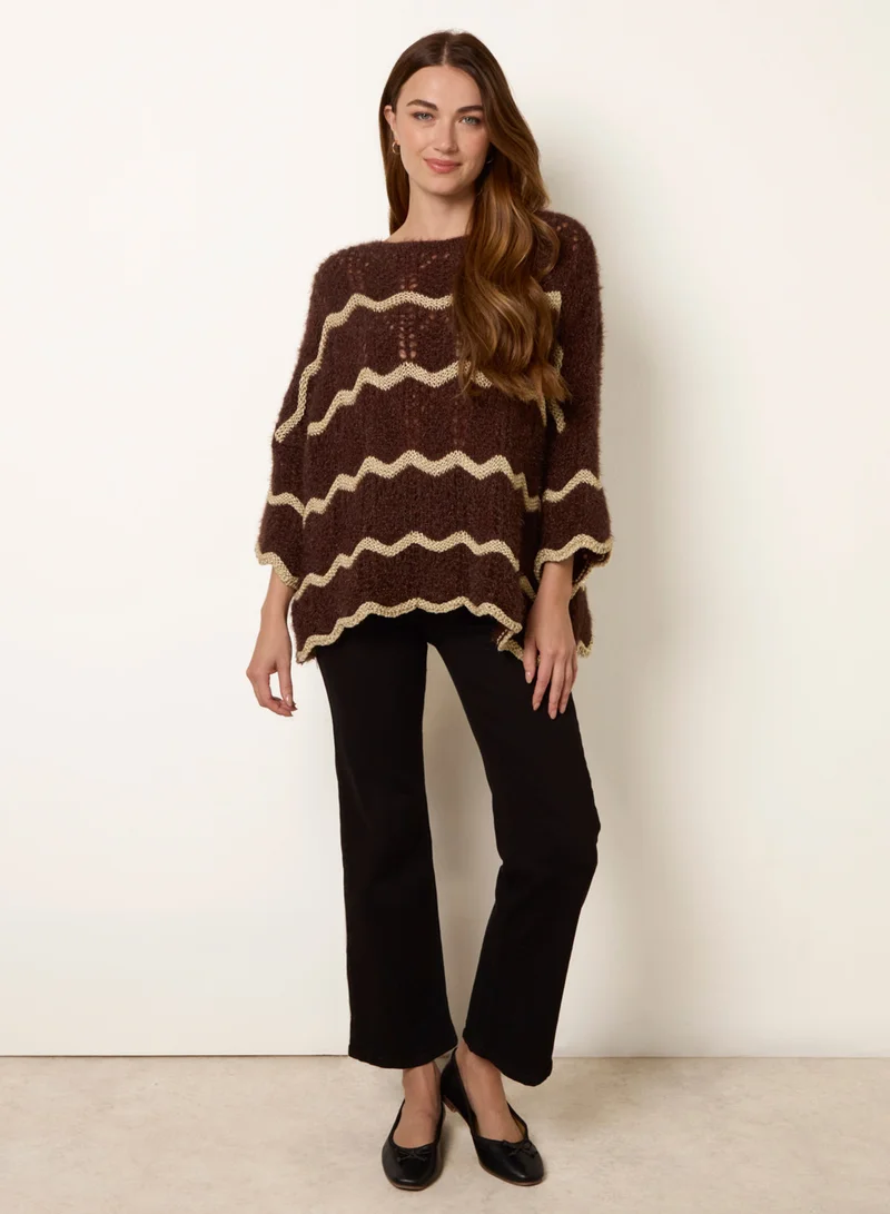 بلو فانيلا كنزة متعرجة معدنية