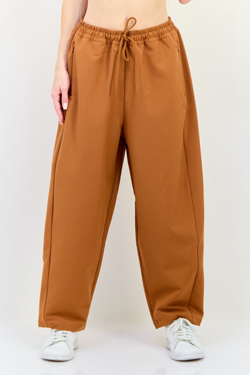 PUMA سروال رياضي نسائي مناسب في الهواء الطلق، بني - Image 1