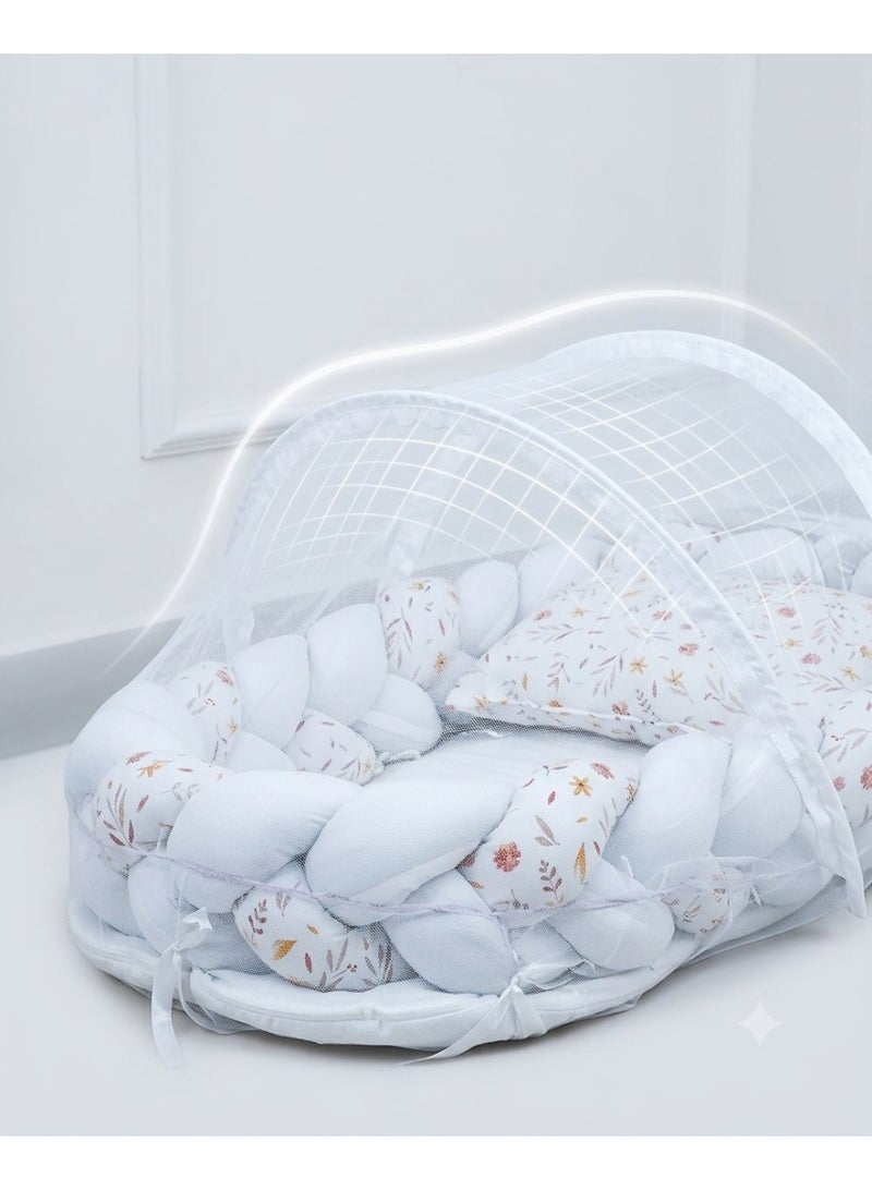StarKids A portable newborn bed featuring a cozy nest design, a braided protective bumper, and a detachable, built-in mosquito net, ensuring a peaceful, safe, and comfortable sleeping environment for your baby—anytime, anywhere. - Image 4