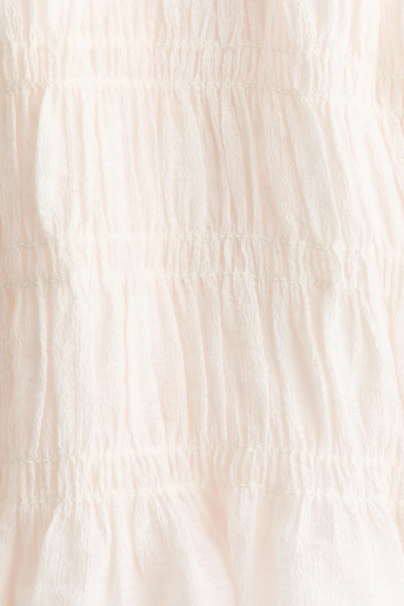 اتش اند ام بلوزة بياقة بيبلوم مزينة بكشكشة