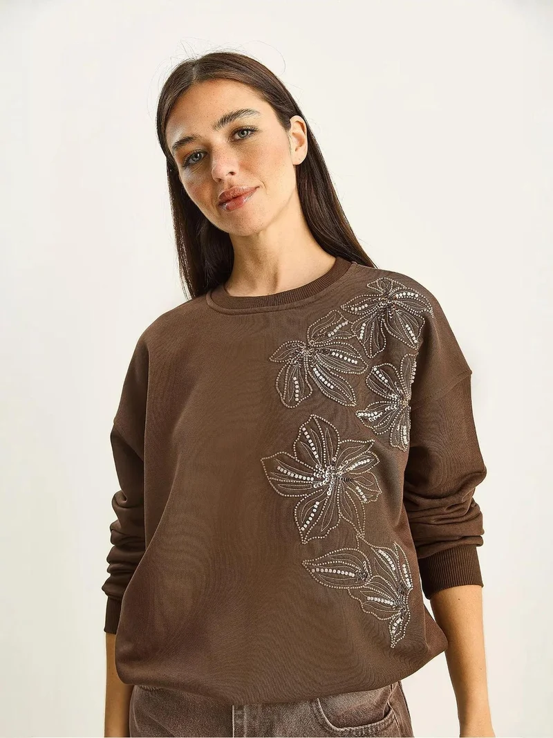 بيانكو لوتشي بلوفر لوكسي بنقشة زهور بياقة دائرية وقصة مريحة