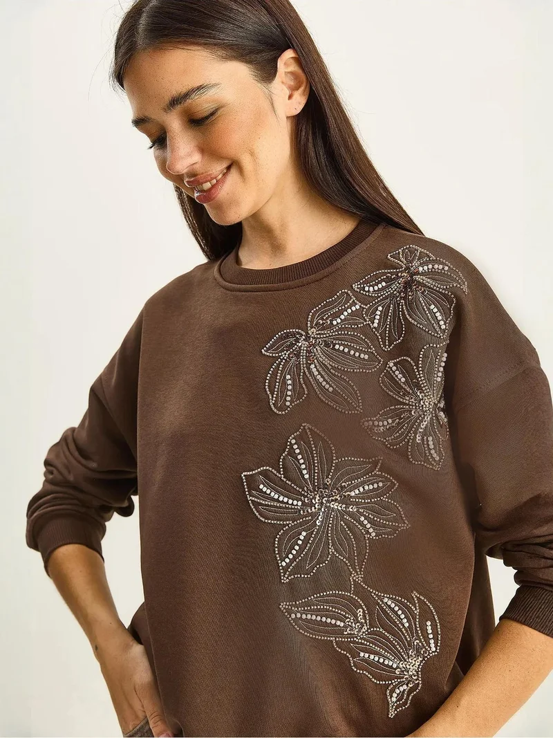 بيانكو لوتشي بلوفر لوكسي بنقشة زهور بياقة دائرية وقصة مريحة