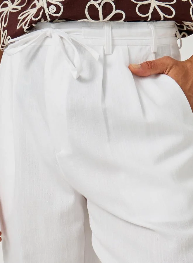Styli Styli Textured Pleated Tapered Fit Trousers