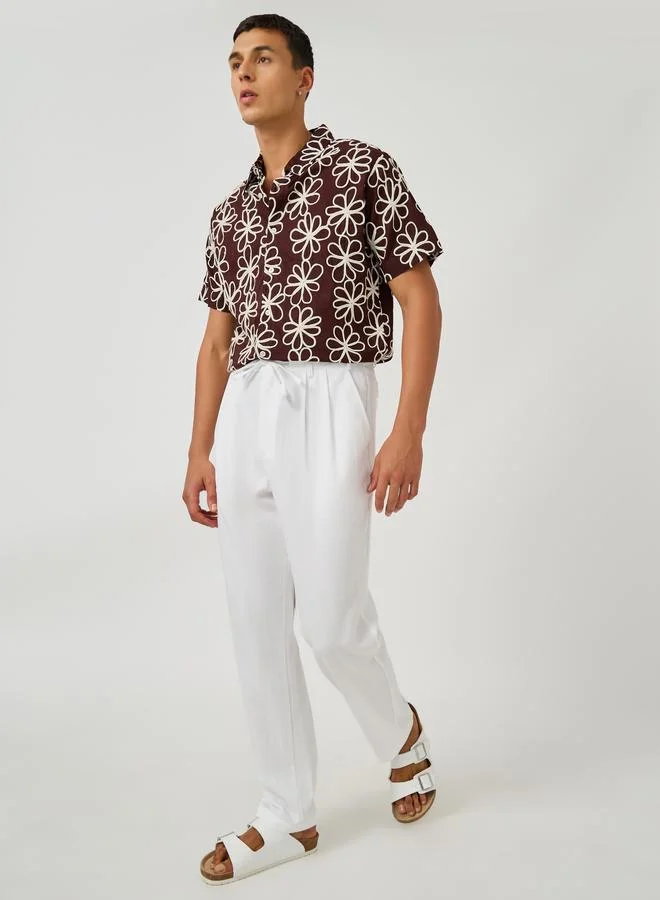 Styli Styli Textured Pleated Tapered Fit Trousers