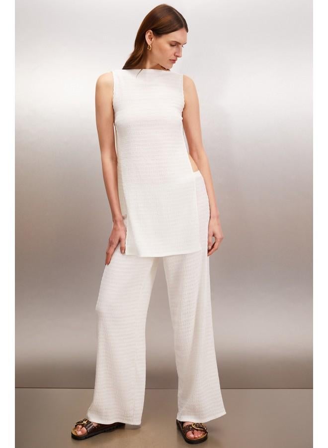 جريميلانج بلوزة نسائية طويلة بدون أكمام بلون إكرو من جريملانج سيريلون - Image 3