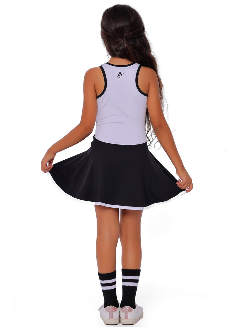 أنچا فستان رياضي باللونين الأبيض والأسود مع تنورة برتقالية للفتيات - Image 3