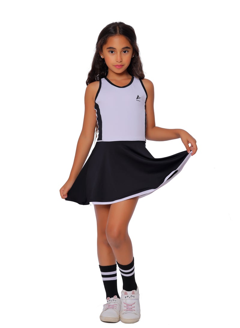 أنچا فستان رياضي باللونين الأبيض والأسود مع تنورة برتقالية للفتيات - Image 2