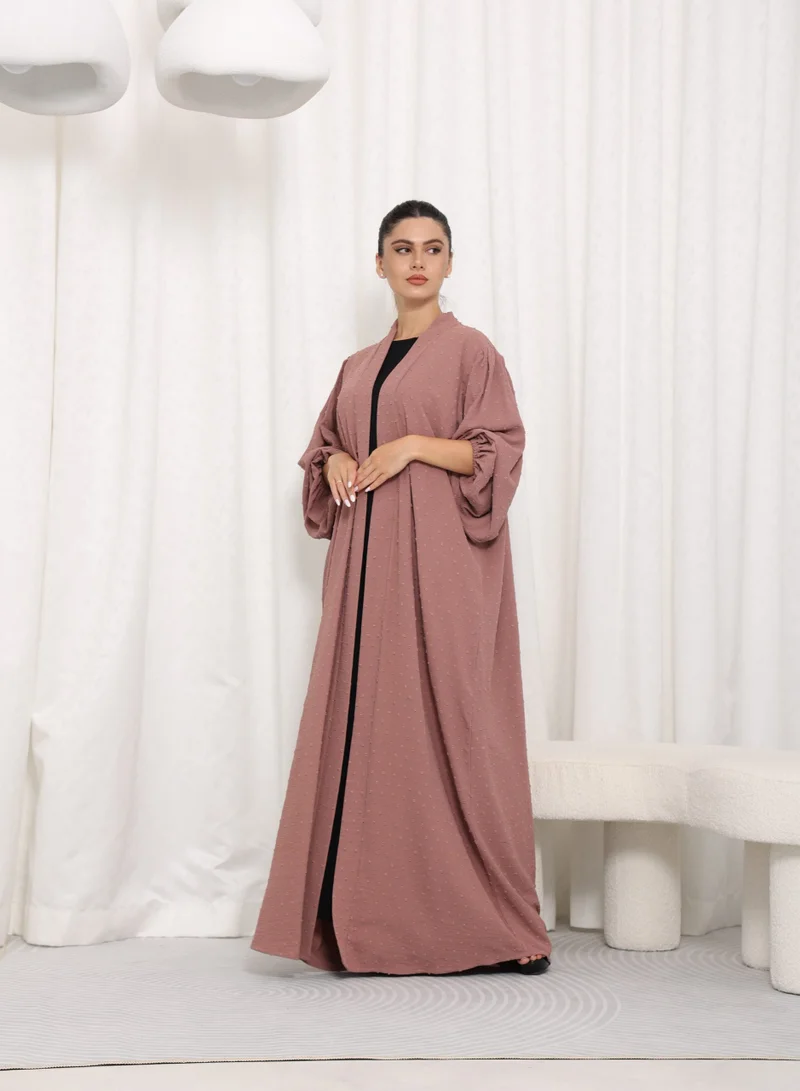 نيكياس عباية وردية منقطة