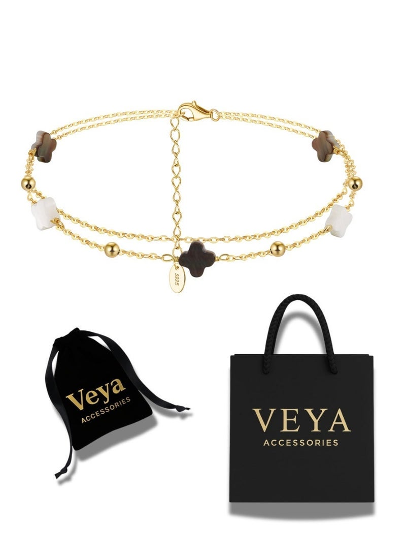 veya "A luxurious anklet from Veya, made of genuine 925 sterling silver and plated with 14k gold, designed with a double jacket adorned with sparkling metal pieces and accents that add charm and elegance to every look. ✨ It comes in a luxurious package that reflects the piece's luxury and quality." - Image 1