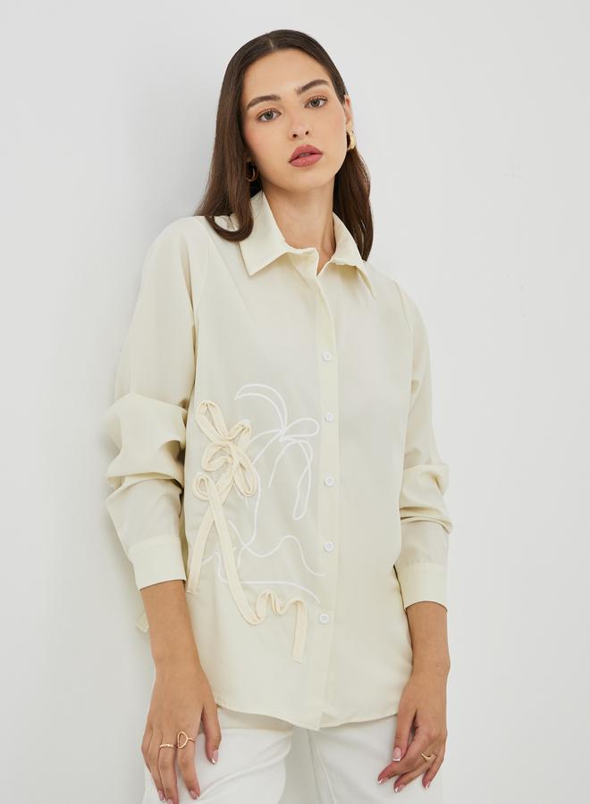 تايك تو قميص واسع بأكمام طويلة مطرز بالزهور - Image 1