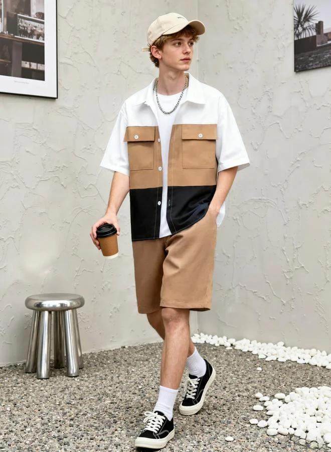 تايك تو طقم منسق من قميص بتفاصيل جيب وشورت بنمط كتل الالوان للرجال