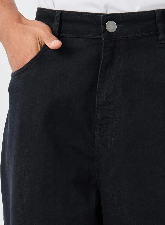 ستايلي جينز واسع الساق بخصر متوسط من Styli