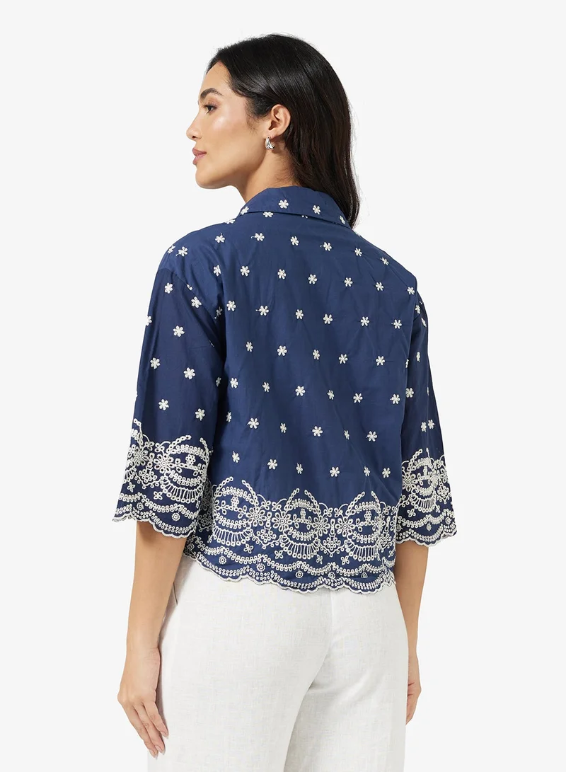 ايلا قميص مطرز بحافة صدفي