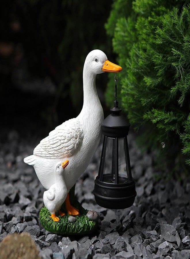 AVEKI Porch Goose Statue, Outdoor Waterproof Goose Garden Statue with Solar Lantern, Duck Resin Garden Sculptures & Statues for Yard Art Lawn Pond, Ideal Solar Goose Figurine Garden Gifts for Women (Duck) - Image 1
