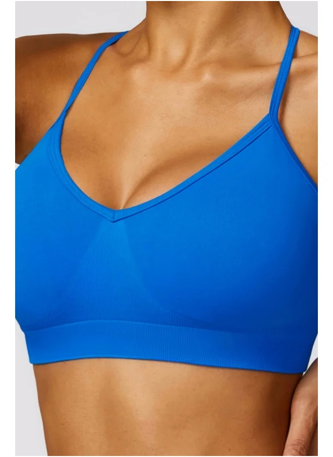 كون.يوغا KAWN YOGA Womens Cross Striped Back Sports Bra - Padded Low Impact Workout Yoga Bra with Removable Built in Bra