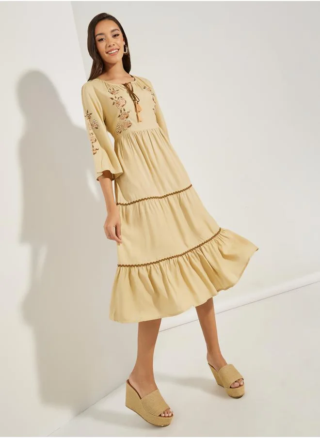 ستايلي Embroidered Panel Tie Tassel Midi Dress