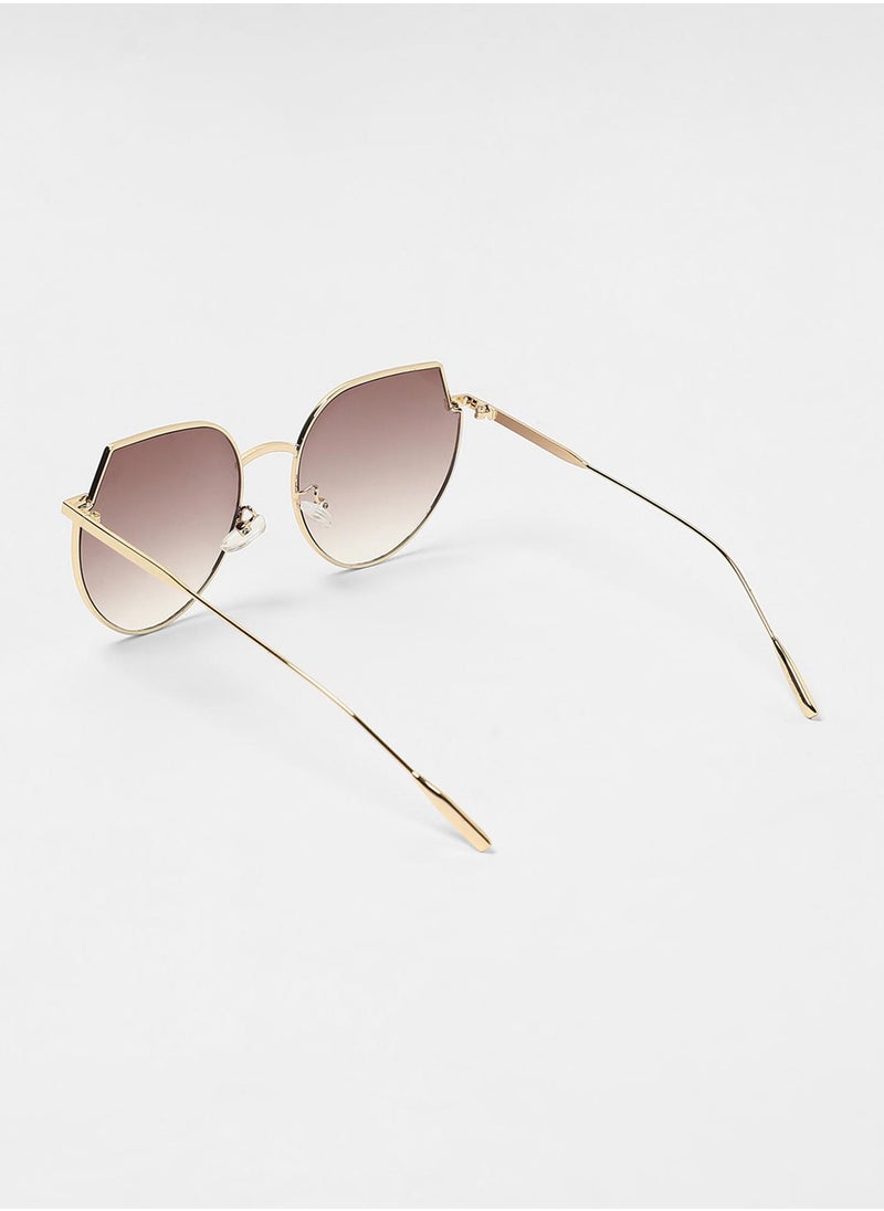 The Curved Cateye Sunglasses - Champayne Gold - pzsku/Z0C4D378A7B8AB353310FZ/45/_/1741336776/baa0963b-ea60-4937-b491-62bab3b796a6