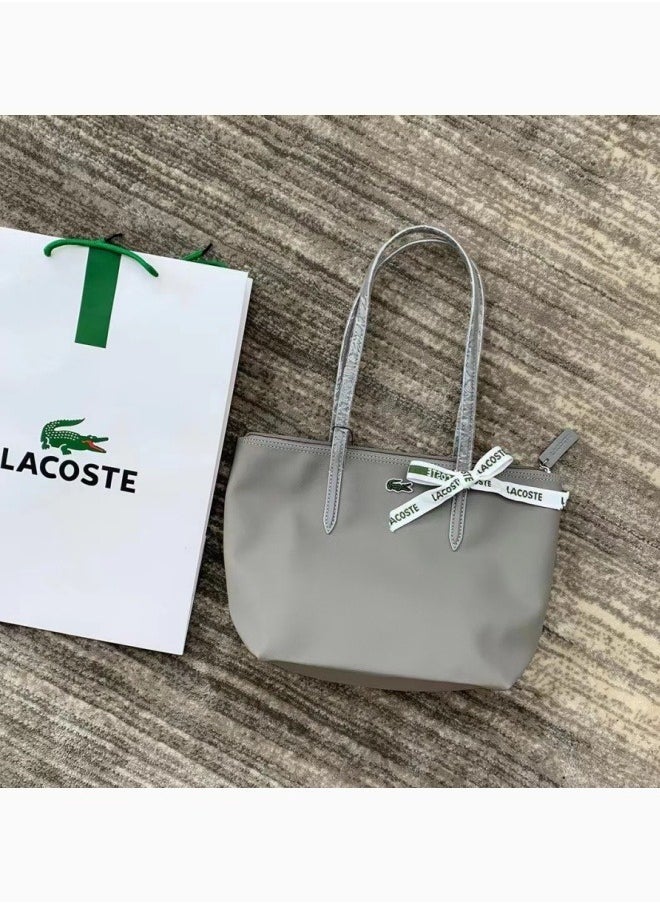 Lacoste Women's Concept Fashion Versatile Small Zipper Handbag Shoulder Bag grey - pzsku/Z0C5478EA099CF5DB43BEZ/45/_/1714028251/cea612ea-d0a0-46fc-8845-2bb74277f148