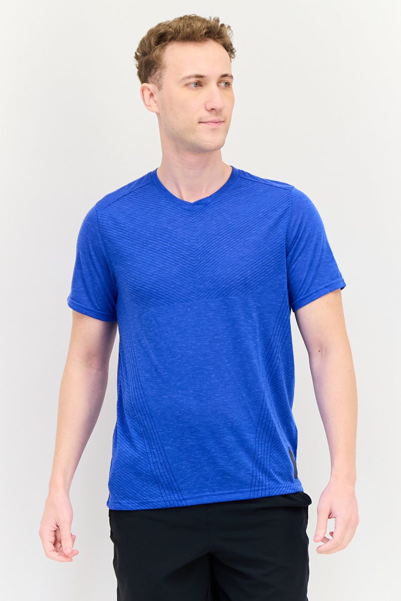 UNDER ARMOUR تي شيرت رياضي للرجال بأكمام قصيرة مناسب للجري، أزرق ملكي - Image 1