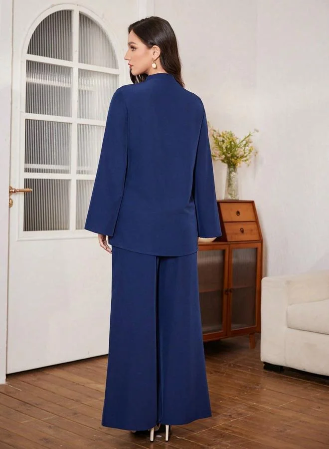 تايك تو طقم بلوزة كحلي بكشكشة وبنطال واسع