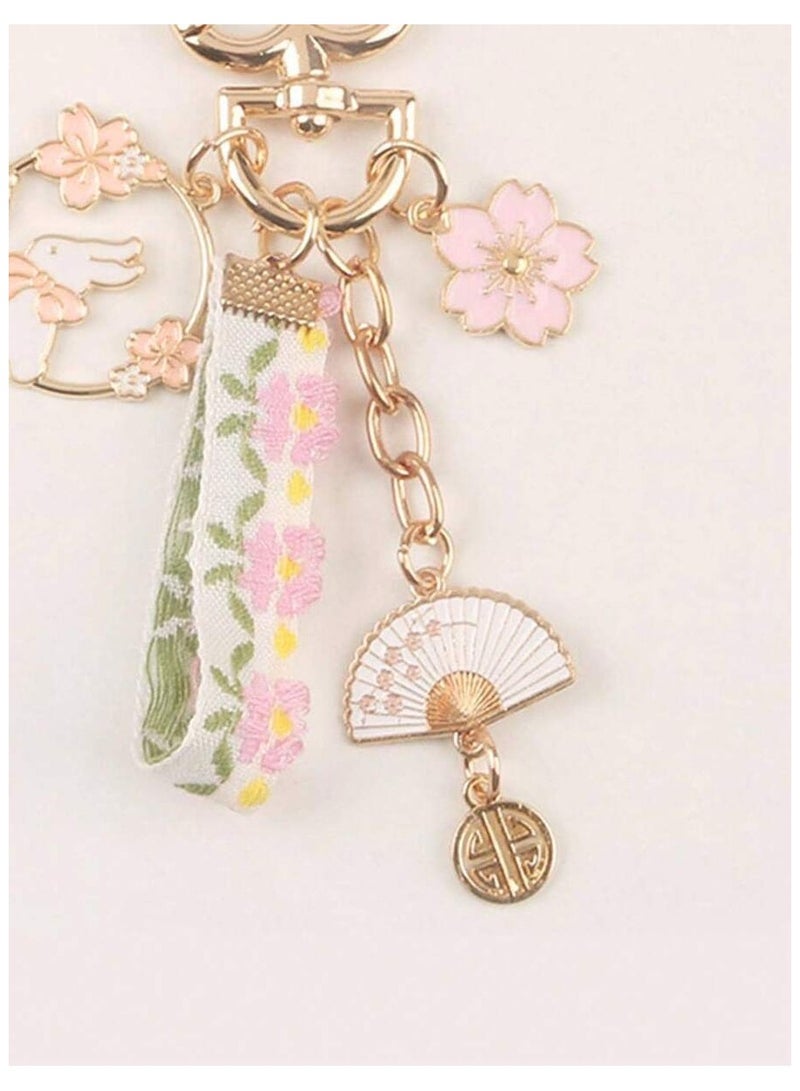 سلسلة مفاتيح مزينة بالزهور مع مشبك على شكل المروحة الصينية - Image 1