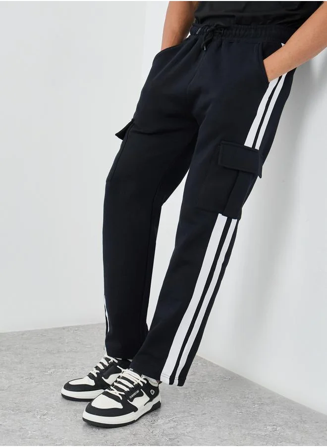 Styli Styli Side Twill Tape Oversized Joggers with Cargo Pockets Deatil