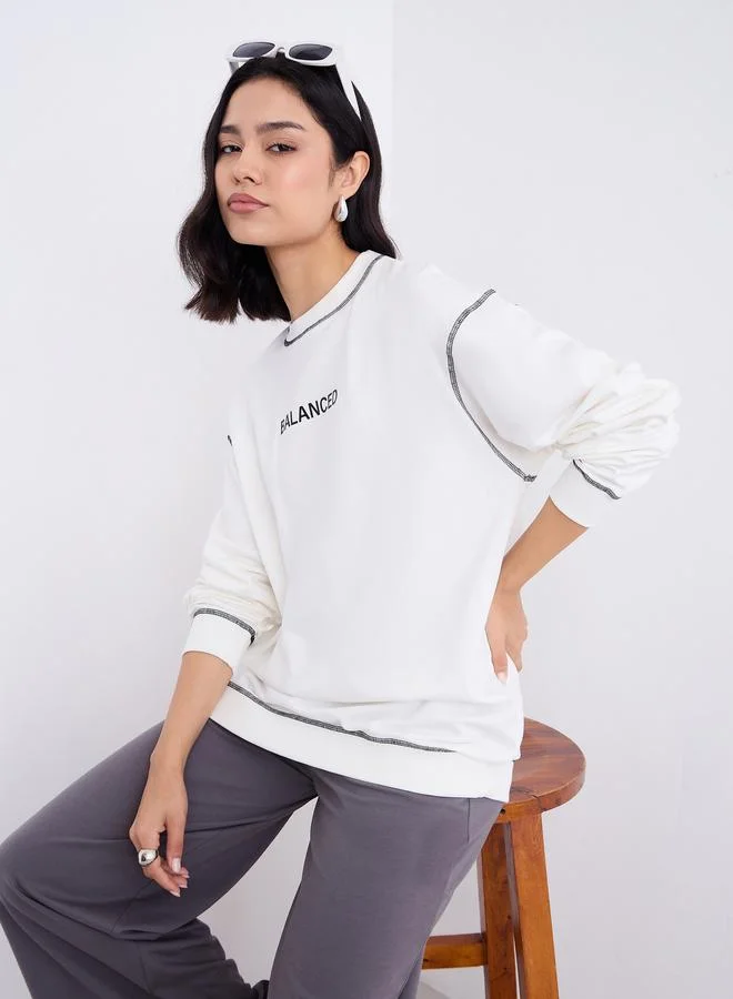 Styli Styli Off White Longline Embroidered Slogan Sweatshirt