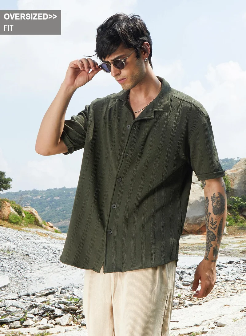 Campus Sutra Campus Sutra Men's Army Green Rope-Textured Oversized Shirt For Casual Wear | Cuban Collar | Short Sleeve | Button Closure | Oversized Shirt Crafted With Comfort Fit For Everyday Wear