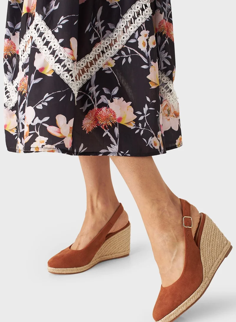 Celeste Pointed Toe Wedge Heel Pumps