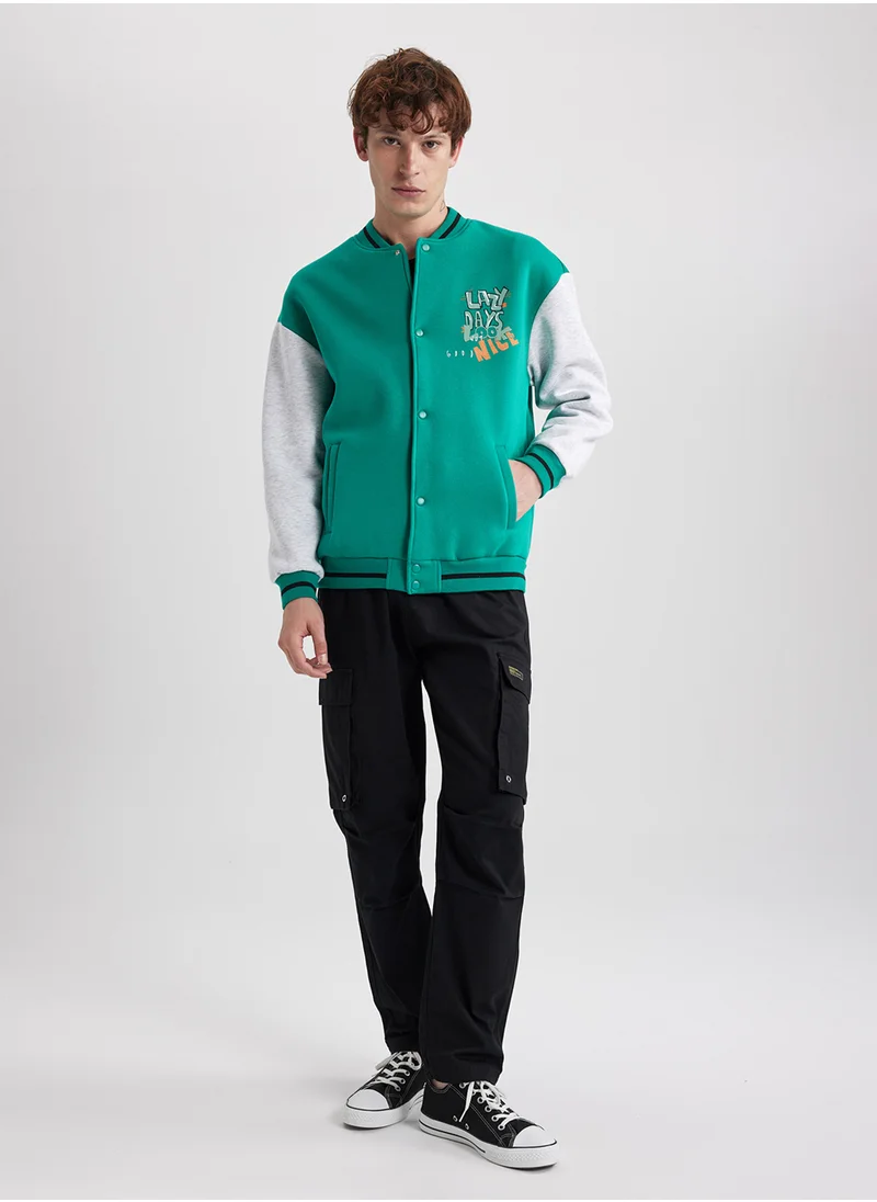 ديفاكتو Oversized Fit Varsity Jacket With Snap Button And Double Pocket