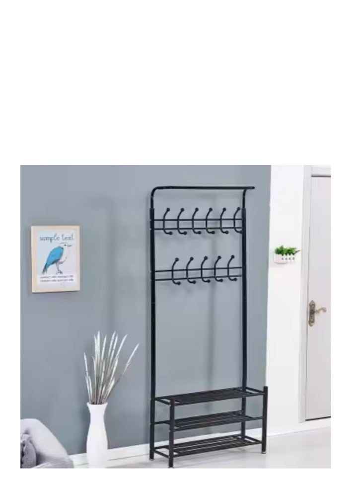 ather Multi-purpose iron rack with shelves suitable for various interior spaces. It is equipped with upper hangers for hanging coats, shawls or hats, in addition to shelves for storing shoes. - Image 1