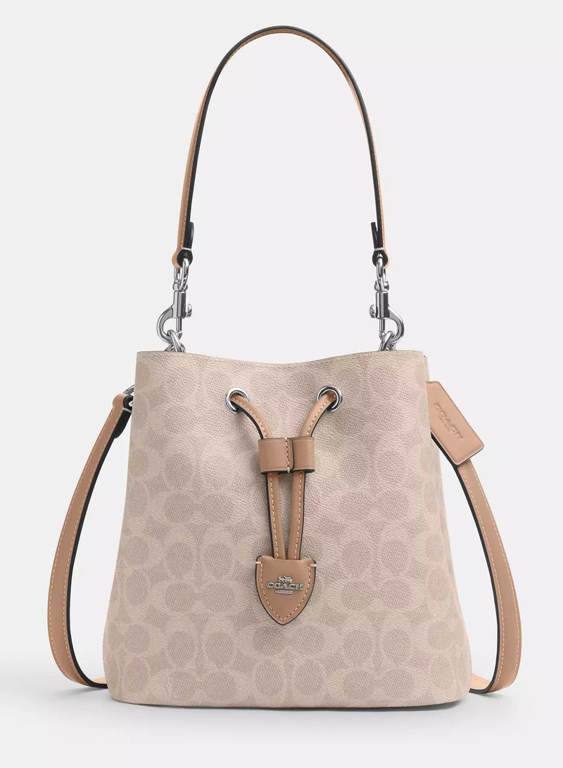 كوتش اوت ليت حقيبة كوتش روان دلو من قماش مميز مع حزام قابل للفصل، حقيبة كتف نسائية، حقيبة كروس نسائية، حقيبة توت نسائية، حقيبة يد نسائية، حقيبة سفر نسائية، بيج - 22 سم - Image 1