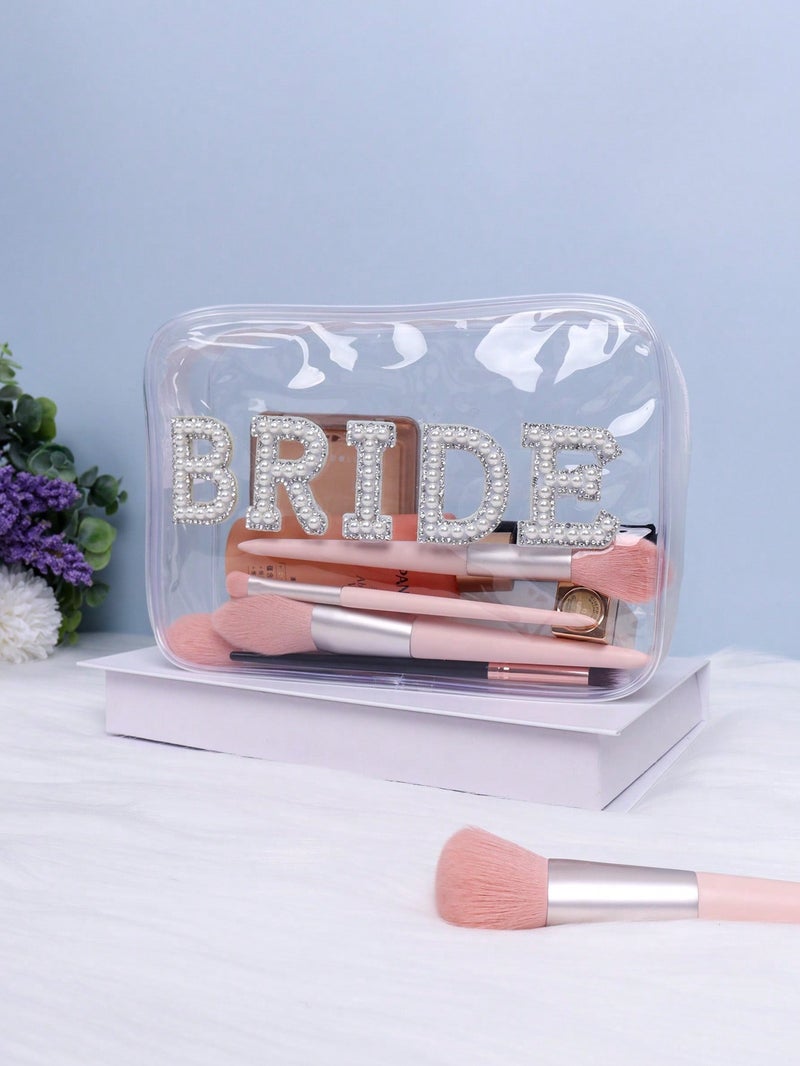 مستلزمات عروس - اكسسوارات عروس شنطة مكياج شفافة بتصميم أنيق مزينة بكلمة "BRIDE" – حقيبة مستلزمات العروس - Image 1