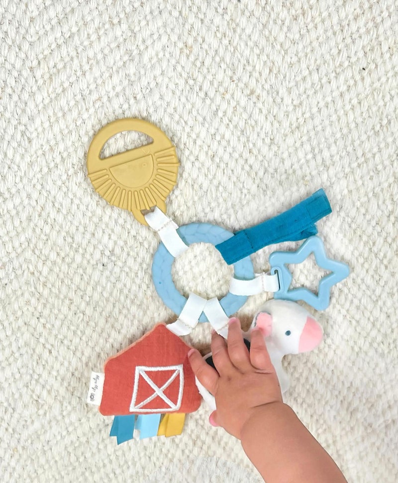 Itzy Ritzy Farm Toy Gift Set - Includes Cow Lovey & Farm-Themed Busy Ring Car Seat and Stroller Toy - Features Crinkle Sounds, Engaging Textures & Silicone Teething Relief (Farm) - Image 3