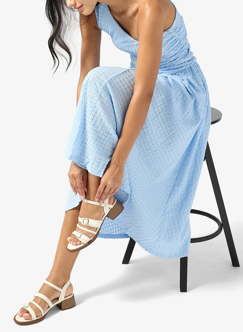 جينجر صنادل بكعب إسفيني