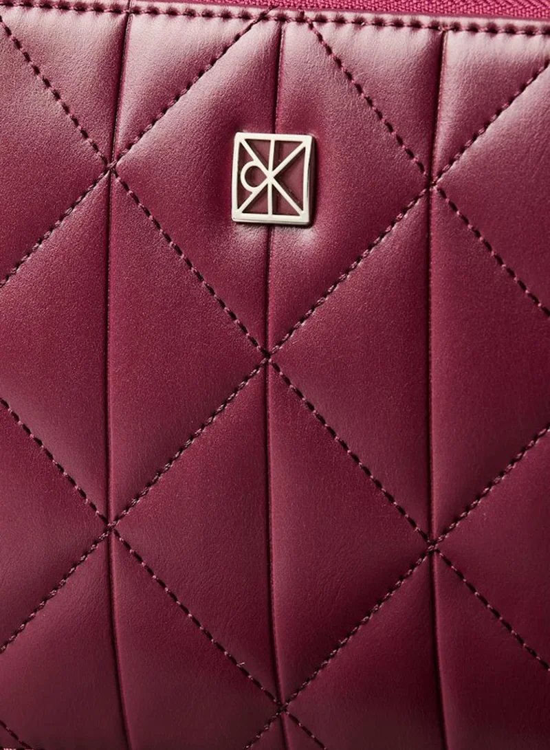 CALVIN KLEIN  Quilted Emblem Logo Double Zip Camera Bag for Women | Best Price UAE