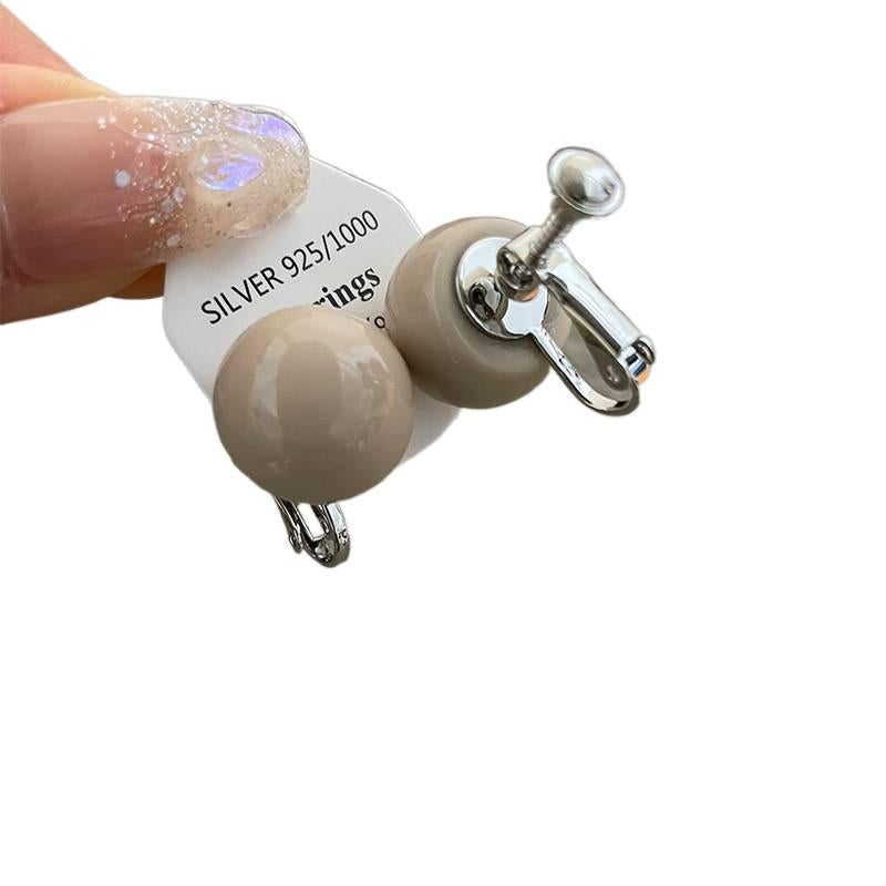 Beige Geometric Pearl Stud Earrings with Silver Detail Lightweight Daily Wear Jewelry for Women - Image 1