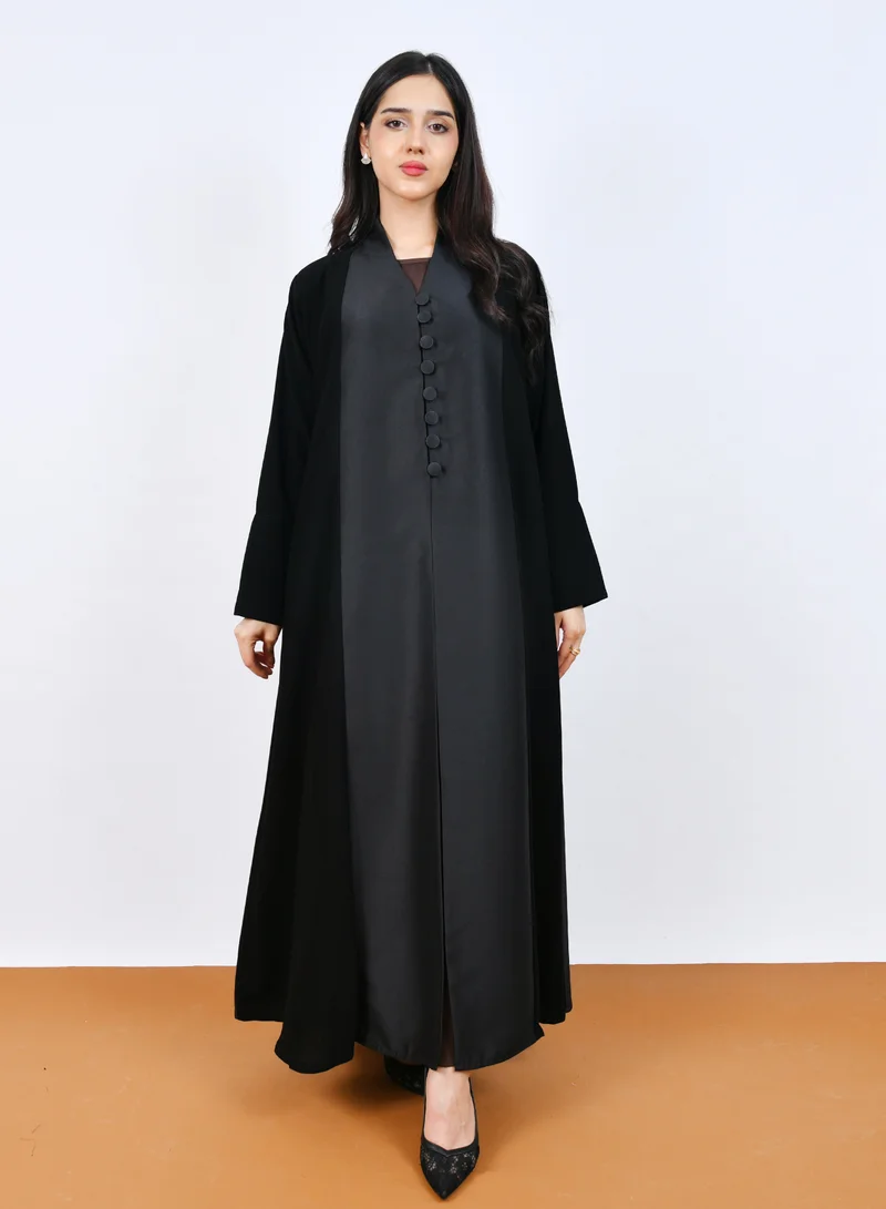 HAWRAA ABAYA Elegant Black Abaya with a classic design featuring front buttons and a half-cloche cut.