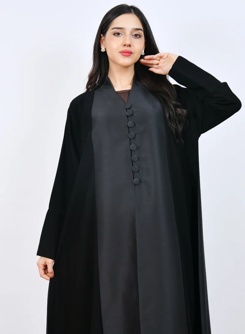 HAWRAA ABAYA Elegant Black Abaya with a classic design featuring front buttons and a half-cloche cut.