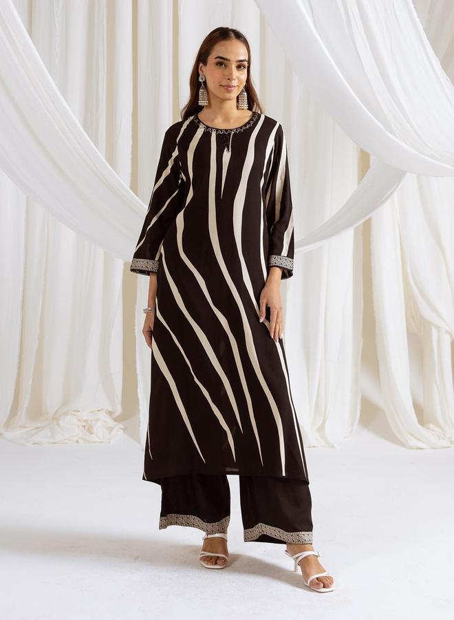 ISHIN Women's Black Rayon Printed Tunic Upper Calf Length Palazzo Bottom Straight Fit 2 Peice Kurta Set - Image 1