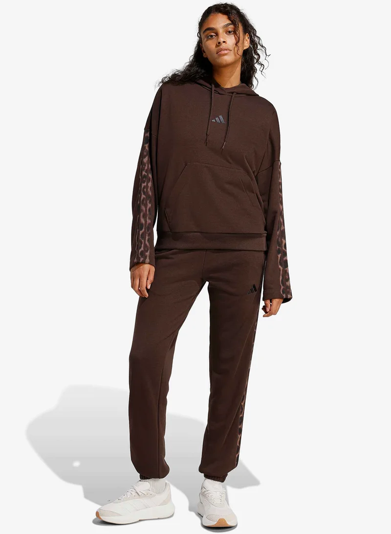 Adidas  Seasonal Essentials Leopard Print French Terry Joggers With 3-Stripes for Women | Best Price UAE