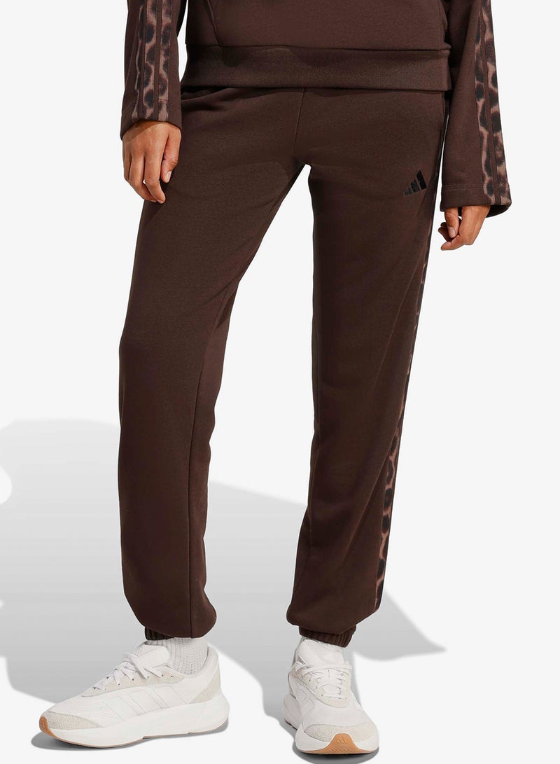 Adidas Seasonal Essentials Leopard Print French Terry Joggers With 3-Stripes - Image 1