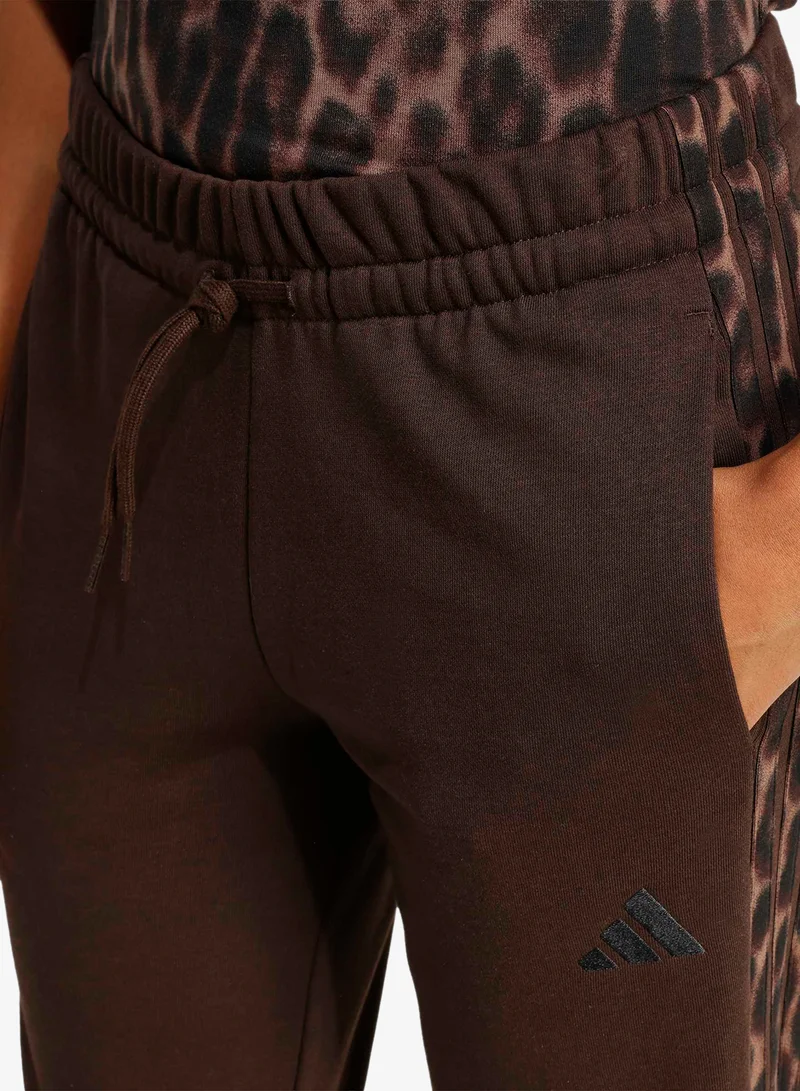 Adidas  Seasonal Essentials Leopard Print French Terry Joggers With 3-Stripes for Women | Best Price UAE