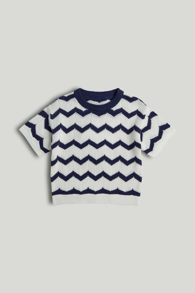 مذركير بلوزة محبوكة بلون أزرق داكن بتصميم موجة