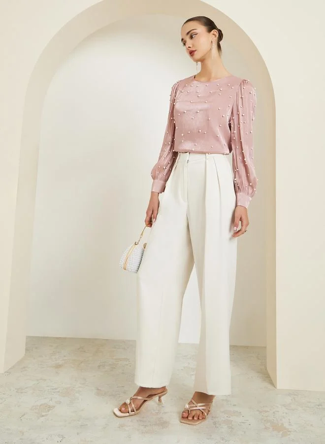 ستايلي بلوزة منمقة بلؤلؤ صناعي وأكمام طويلة